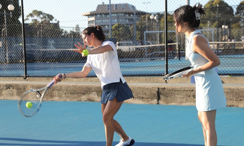 Coach Michela demonstrating a forehand